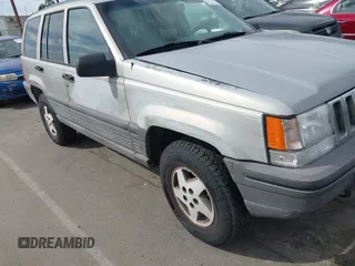 1994 Jeep Grand Cherokee Laredo with VIN 1J4GZ58YXRC325868, listed as a IAAI auction lot 42664900 with 220,149 mi miles and . Bid and sale history available at DreamBid. Image 12.