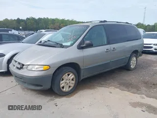 1997 Dodge Caravan LE with VIN 1B4GP54L3VB333541, listed as a IAAI auction lot 41012170 with 137,181 mi miles and . Bid and sale history available at carsss.com. Image 2.