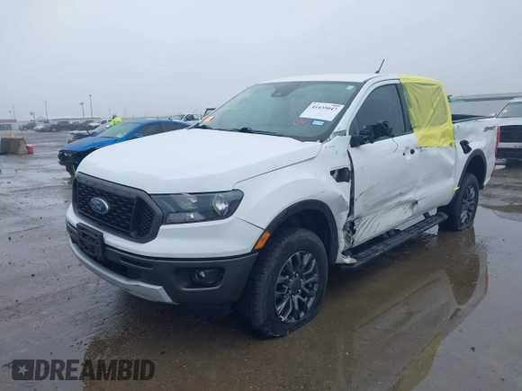 2022 Ford Ranger XL with VIN 1FTER4EH6NLD05672, listed as a IAAI auction lot 41435047 with 56,485 mi miles and . Bid and sale history available at DreamBid. Image 2.