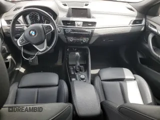 2018 BMW X2 xDrive28i z VIN WBXYJ5C38JEF79686, wystawiony jako Copart lot #56988735 z przebiegiem 103 799 mil mil oraz Szkoda całkowita • Salvage title. Historia ofert i sprzedaży dostępna na DreamBid. Obrazek 8.