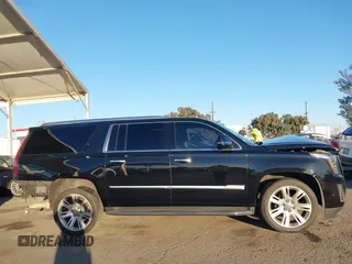2020 Cadillac Escalade ESV Luxury z VIN 1GYS4HKJ3LR181834, wystawiony jako IAAI lot #40813416 z przebiegiem 65 857 mil mil oraz . Historia ofert i sprzedaży dostępna na DreamBid. Obrazek 14.