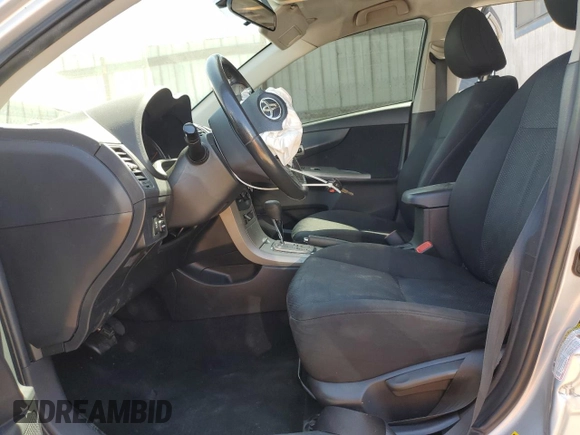 2010 Toyota Corolla with VIN 2T1BU4EE8AC427717, listed as a Copart auction lot 57528435 with 142,826 mi miles and Salvage title. Bid and sale history available at DreamBid. Image 7.