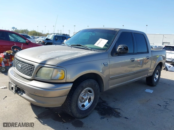 2001 Ford F-150 SuperCrew XLT with VIN 1FTRW07L91KE82351, listed as a IAAI auction lot 41843116 with 305,004 mi miles. Bid and sale history available at carsss.com. Image 17.