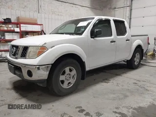 2005 Nissan Frontier LE with VIN 1N6AD07W95C405781, listed as a IAAI auction lot 41782375 with 174,910 mi miles and . Bid and sale history available at DreamBid. Image 2.