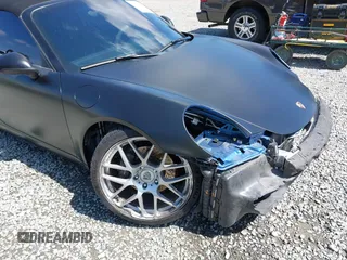 2014 Porsche 911 Carrera z VIN WP0CA2A94ES140857, wystawiony jako IAAI lot #42159010 z przebiegiem 46 230 mil mil oraz . Historia ofert i sprzedaży dostępna na DreamBid. Obrazek 6.