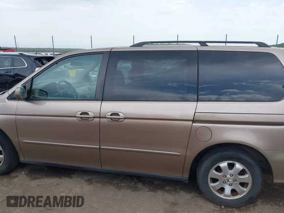 2003 Honda Odyssey EX-L z VIN 5FNRL18063B135949, wystawiony jako IAAI lot #42248105 z przebiegiem 210 567 mil mil oraz . Historia ofert i sprzedaży dostępna na DreamBid. Obrazek 14.
