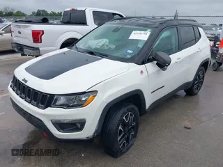 2020 Jeep Compass Trailhawk z VIN 3C4NJDDB6LT126585, wystawiony jako IAAI lot #42210794 z przebiegiem 132 220 mil mil oraz . Historia ofert i sprzedaży dostępna na DreamBid. Obrazek 17.