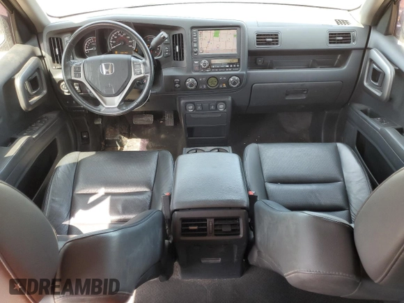 2013 Honda Ridgeline RTL with VIN 5FPYK1F51DB012680, listed as a Copart auction lot 50987085 with 63,372 mi miles and Salvage Title. Bid and sale history available at carsss.com. Image 8.