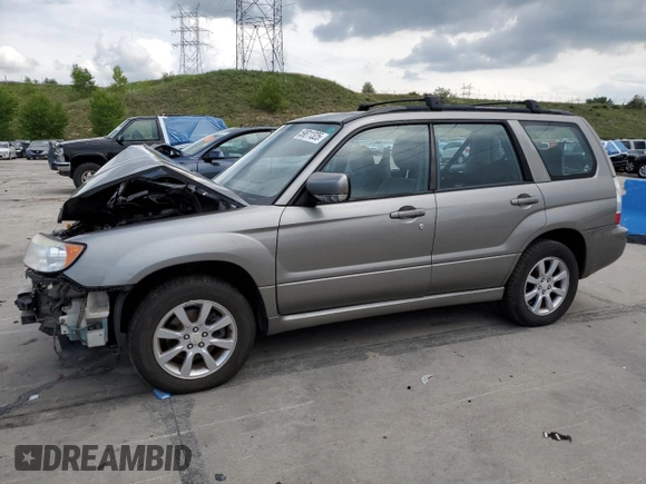 2006 Subaru Forester X with VIN JF1SG65656H709849, listed as a Copart auction lot 59811325 with 198,659 mi miles and Salvage title. Bid and sale history available at DreamBid. Image 1.