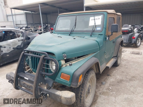 1997 Jeep Wrangler SE with VIN 1J4FY29P1VP408966, listed as a IAAI auction lot 41683640 with 106,910 mi miles. Bid and sale history available at carsss.com. Image 17.
