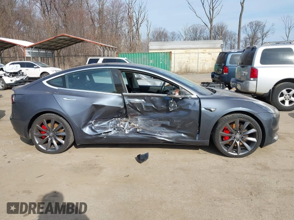 2018 Tesla Model 3 Long Range Battery with VIN 5YJ3E1EB5JF063077, listed as a IAAI auction lot 41773551 with 99,477 mi miles and . Bid and sale history available at DreamBid. Image 13.