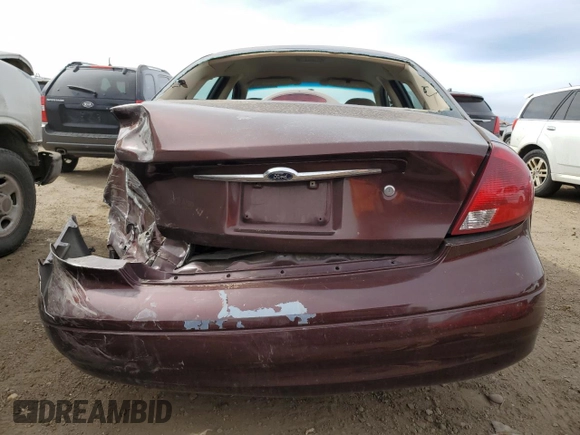2001 Ford Taurus SES with VIN 1FAFP55S61G184193, listed as a Copart auction lot 49190475 with 129,415 mi miles and Salvage Title. Bid and sale history available at DreamBid. Image 6.