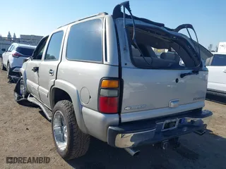 2004 Chevrolet Tahoe LS with VIN 1GNEC13T64J282970, listed as a IAAI auction lot 41879458 with 205,952 mi miles. Bid and sale history available at carsss.com. Image 3.