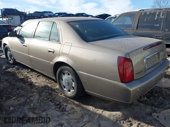 2002 Cadillac DeVille DHS z VIN 1G6KE57Y22U225134, wystawiony jako IAAI lot #41350531 z przebiegiem 126 457 mil mil oraz . Historia ofert i sprzedaży dostępna na DreamBid. Obrazek 3.