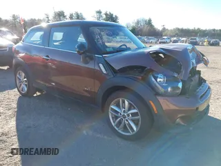 2013 MINI Paceman S ALL4 with VIN WMWSS7C56DWN71558, listed as a IAAI auction lot 40807824 with 77,773 mi miles and . Bid and sale history available at DreamBid. Image 1.