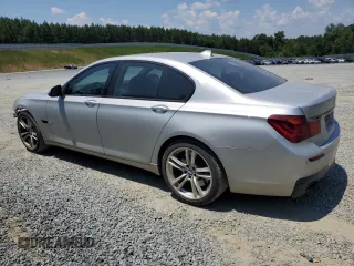 2013 BMW 7 Series 750i with VIN WBAYA8C58DC996865, listed as a Copart auction lot 61831294 with 151,238 mi miles and Salvage Title. Bid and sale history available at DreamBid. Image 2.
