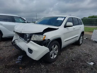 2011 Jeep Grand Cherokee Laredo with VIN 1J4RR4GG7BC701007, listed as a IAAI auction lot 42704995 with 145,956 mi miles and . Bid and sale history available at DreamBid. Image 2.