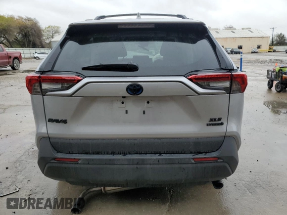 2024 Toyota RAV4 Hybrid XLE Premium with VIN 4T3B6RFV9RU167402, listed as a Copart auction lot 89083875 with 5,923 mi miles and Salvage Title. Bid and sale history available at DreamBid. Image 6.