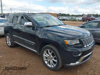 2015 Jeep Grand Cherokee Summit with VIN 1C4RJFJT1FC768707, listed as a IAAI auction lot 41863454 with 122,564 mi miles. Bid and sale history available at carsss.com. Image 1.