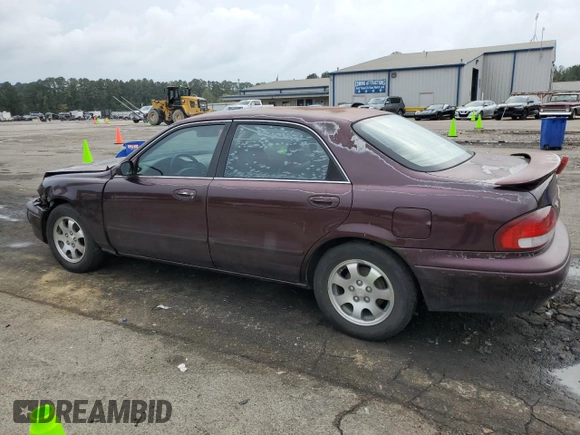 1998 Mazda 626 DX z VIN 1YVGF22CXW5775511, wystawiony jako Copart lot #78748784 z przebiegiem 158 570 mil mil oraz Szkoda całkowita • Salvage title. Historia ofert i sprzedaży dostępna na DreamBid. Obrazek 2.