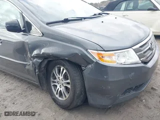 2011 Honda Odyssey EX-L with VIN 5FNRL5H61BB097069, listed as a IAAI auction lot 41723100 with 252,529 mi miles. Bid and sale history available at carsss.com. Image 6.
