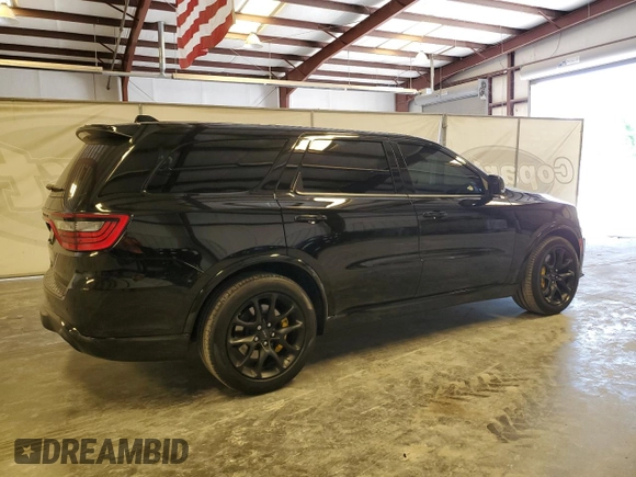 2023 Dodge Durango SRT Hellcat Premium с VIN 1C4SDJH98PC584727, выставлен на аукционе Copart как лот 59151835 с пробегом 5 506 миль миль и Чистый • Clean title. История ставок и продаж доступна на DreamBid. Изображение 3.