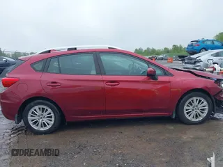 2018 Subaru Impreza Premium z VIN 4S3GTAB63J3720910, wystawiony jako IAAI lot #42331367 z przebiegiem 59 216 mil mil oraz . Historia ofert i sprzedaży dostępna na DreamBid. Obrazek 13.