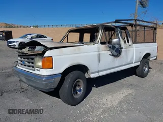 1988 Ford F-150 with VIN 1FTEX14N9JKB33407, listed as a IAAI auction lot 41278671 with 1 mi miles. Bid and sale history available at carsss.com. Image 16.