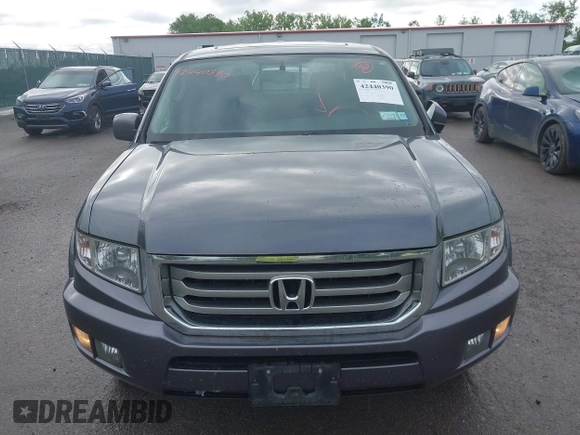 2014 Honda Ridgeline RTL with VIN 5FPYK1F5XEB011772, listed as a IAAI auction lot 42440390 with 145,219 mi miles and . Bid and sale history available at DreamBid. Image 12.