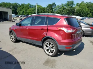 2015 Ford Escape Titanium with VIN 1FMCU9J9XFUA34821, listed as a Copart auction lot 63681805 with 163,873 mi miles and Clean title. Bid and sale history available at DreamBid. Image 2.