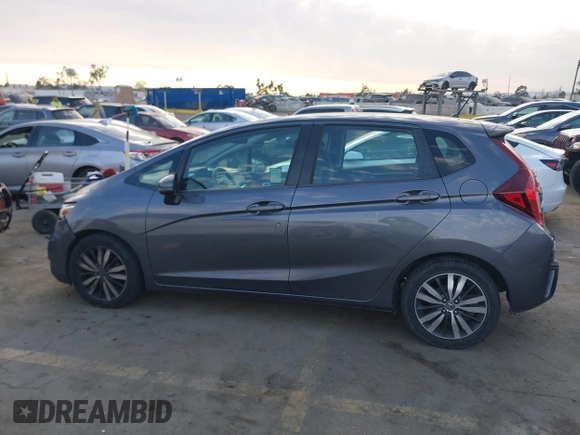 2015 Honda Fit LX with VIN 3HGGK5H5XFM719477, listed as a IAAI auction lot 41671194 with 145,876 mi miles. Bid and sale history available at carsss.com. Image 14.
