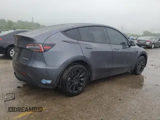 2021 Tesla Model Y Long Range z VIN 5YJYGDEE6MF209034, wystawiony jako Copart lot #57313585 z przebiegiem 54 259 mil mil oraz Szkoda całkowita • Salvage title. Historia ofert i sprzedaży dostępna na DreamBid. Obrazek 3.