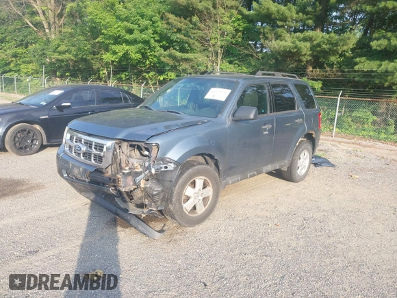 2011 Ford Escape XLT with VIN 1FMCU9D77BKB11600, listed as a IAAI auction lot 42579732 with 147,247 mi miles and . Bid and sale history available at DreamBid. Image 2.