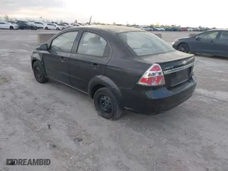 2009 Chevrolet Aveo LT w/1LT with VIN KL1TD56E09B626562, listed as a IAAI auction lot 41876182 with 108,496 mi miles. Bid and sale history available at carsss.com. Image 3.