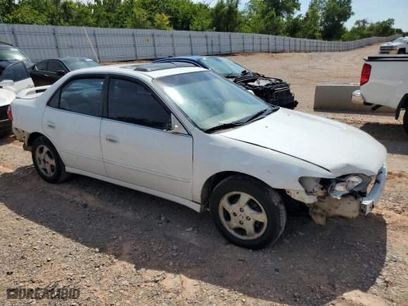1999 Honda Accord Sdn EX with VIN JHMCG5657XC021847, listed as a Copart auction lot 61145114 with 260,581 mi miles and Salvage Title. Bid and sale history available at carsss.com. Image 4.