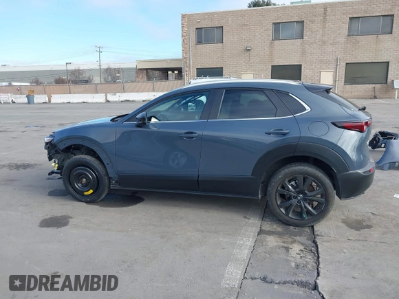 2023 Mazda CX-30 S Carbon Edition with VIN 3MVDMBCM7PM589019, listed as a IAAI auction lot 41251168 with 23,847 mi miles and . Bid and sale history available at DreamBid. Image 15.