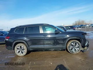 2024 Volkswagen Atlas SE z VIN 1V2LR2CA5RC576809, wystawiony jako IAAI lot #41652203 z przebiegiem 11 300 mil mil oraz . Historia ofert i sprzedaży dostępna na DreamBid. Obrazek 13.