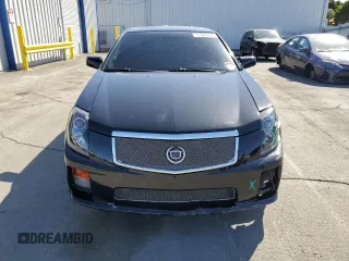 2004 Cadillac CTS-V z VIN 1G6DN57S440130637, wystawiony jako Copart lot #57805015 z przebiegiem 145 633 mil mil oraz Szkody całkowita. Historia ofert i sprzedaży dostępna na DreamBid. Obrazek 5.