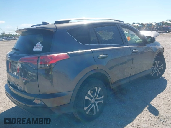 2018 Toyota RAV4 LE with VIN JTMZFREV7JJ207270, listed as a IAAI auction lot 41853828 with 89,179 mi miles. Bid and sale history available at carsss.com. Image 4.