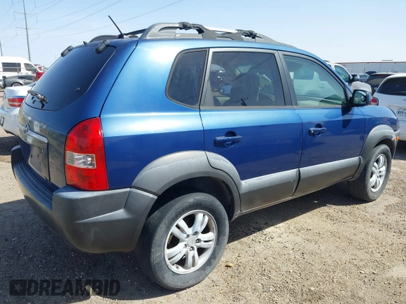 2007 Hyundai Tucson SE with VIN KM8JN12D97U503794, listed as a IAAI auction lot 41810035 with 136,321 mi miles. Bid and sale history available at carsss.com. Image 4.