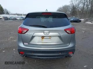 2013 Mazda CX-5 Grand Touring with VIN JM3KE4DE2D0115154, listed as a IAAI auction lot 41706007 with 153,532 mi miles. Bid and sale history available at carsss.com. Image 16.