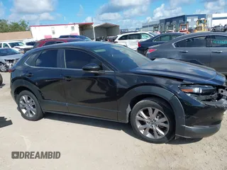 2021 Mazda CX-30 Select z VIN 3MVDMABL1MM251761, wystawiony jako IAAI lot #42267217 z przebiegiem 42 617 mil mil oraz . Historia ofert i sprzedaży dostępna na DreamBid. Obrazek 12.