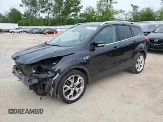 2015 Ford Escape Titanium z VIN 1FMCU9J99FUA90281, wystawiony jako Copart lot #59972565 z przebiegiem 125 351 mil mil oraz Czysty tytuł • Clean title. Historia ofert i sprzedaży dostępna na DreamBid. Obrazek 1.