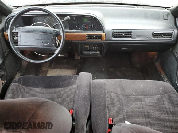 1991 Ford Taurus with VIN 1FACP52U9MG101093, listed as a Copart auction lot 45948105 with 594,696 mi miles and Salvage title. Bid and sale history available at DreamBid. Image 8.