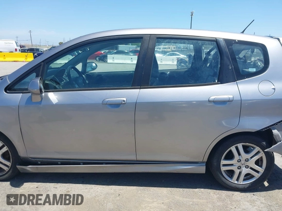 2007 Honda Fit Sport with VIN JHMGD38637S067718, listed as a IAAI auction lot 42348751 with 135,198 mi miles and . Bid and sale history available at DreamBid. Image 14.