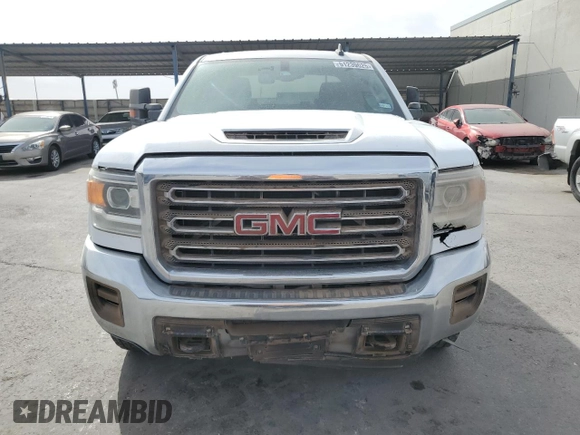 2018 GMC Sierra 2500HD с VIN 1GT12REY7JF202463, выставлен на аукционе Copart как лот 51239625 с пробегом 179 006 миль миль и Чистый • Clean title. История ставок и продаж доступна на DreamBid. Изображение 5.