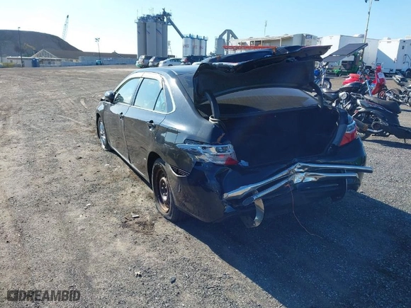 2015 Toyota Camry Hybrid LE with VIN 4T1BD1FK5FU170038, listed as a IAAI auction lot 41751734 with 292,193 mi miles. Bid and sale history available at carsss.com. Image 3.