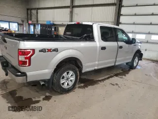 2018 Ford F-150 XL with VIN 1FTFW1E50JFB35013, listed as a Copart auction lot 57240755 with 127,401 mi miles and Salvage title. Bid and sale history available at DreamBid. Image 3.