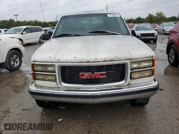 1997 GMC Suburban z VIN 1GKGK26JXVJ715765, wystawiony jako Copart lot #73188284 z przebiegiem 301 101 mil mil oraz Szkoda całkowita • Salvage title. Historia ofert i sprzedaży dostępna na DreamBid. Obrazek 5.
