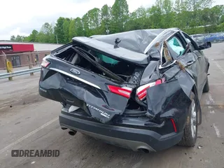 2020 Ford Edge Titanium z VIN 2FMPK4K98LBB12684, wystawiony jako IAAI lot #42134532 z przebiegiem 103 786 mil mil oraz . Historia ofert i sprzedaży dostępna na DreamBid. Obrazek 16.